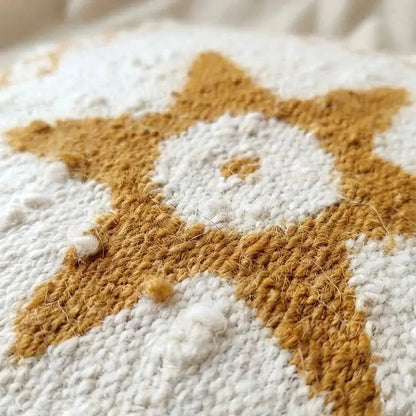 Motif étoile en laine beige et marron tissé en gros plan avec texture détaillée